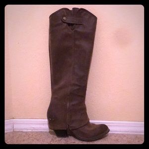 Fergie Tall heeled boots.